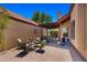 Outdoor patio area featuring seating, fire pit, and outdoor kitchen with grill at 1910 E Citation Ln, Tempe, AZ 85284