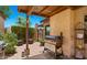 Covered patio area with outdoor grill, perfect for entertaining and enjoying outdoor living at 1910 E Citation Ln, Tempe, AZ 85284