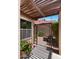 Enclosed patio space featuring a decorative metal gate for added privacy and security at 1910 E Citation Ln, Tempe, AZ 85284