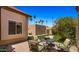 Cozy outdoor seating area with a fire pit, artificial grass and landscaping at 1910 E Citation Ln, Tempe, AZ 85284