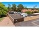 Outdoor RV parking area with a secure fence, featuring a variety of recreational vehicles in a gated setting at 1910 E Citation Ln, Tempe, AZ 85284
