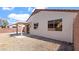 Low maintenance backyard featuring a covered patio, with block wall fencing at 19523 N Carriage Ln, Surprise, AZ 85374