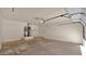 Spacious garage with ample room for parking and storage, providing convenience and functionality at 19523 N Carriage Ln, Surprise, AZ 85374