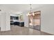 Modern kitchen with stainless steel appliances and sliding glass doors at 19523 N Carriage Ln, Surprise, AZ 85374