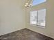 Cozy dining area featuring a large window for ample light and sleek tile flooring at 2100 W Lemon Tree Pl # 59, Chandler, AZ 85224
