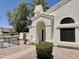 Inviting home exterior with a covered entryway, manicured shrubbery, and desert landscaping at 2100 W Lemon Tree Pl # 59, Chandler, AZ 85224