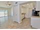 Open-concept kitchen with stainless steel appliances and views into the living area at 2100 W Lemon Tree Pl # 59, Chandler, AZ 85224
