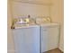 Dedicated laundry room with standard size washer and dryer at 2100 W Lemon Tree Pl # 59, Chandler, AZ 85224