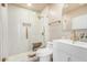 Stylish bathroom featuring a glass-enclosed shower, modern vanity, and gold fixtures at 2111 N Van Ness Ave, Tempe, AZ 85288