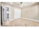 Bright bedroom offers herringbone floors, neutral paint, and closet space at 2111 N Van Ness Ave, Tempe, AZ 85288