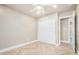Bedroom featuring herringbone floors, closet with sliding doors, and doorway at 2111 N Van Ness Ave, Tempe, AZ 85288