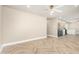 Open-concept living area with herringbone floors and easy access to kitchen and dining at 2111 N Van Ness Ave, Tempe, AZ 85288