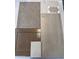Selection of interior design materials including carpet, tile, quartz, and wood finish for cabinets at 23040 E Watford Dr, Queen Creek, AZ 85142