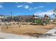 A safe and fun playground with swings and slides, inviting children to play and socialize in a secure environment at 23056 E Watford Dr, Queen Creek, AZ 85142
