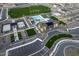 Primary-planned community featuring a pool, clubhouse, playground, sports courts, and ample green space at 23064 E Watford Dr, Queen Creek, AZ 85142