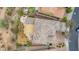 Captivating aerial view of a home with a detailed tile roof, outdoor living space, and neat landscaping at 23126 N 45Th Pl, Phoenix, AZ 85050