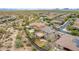 Two-story home aerial view featuring extended covered patio and landscaped backyard in a desert community at 23126 N 45Th Pl, Phoenix, AZ 85050