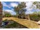 The yard features a beautifully manicured lawn and mature landscaping at 23126 N 45Th Pl, Phoenix, AZ 85050