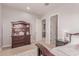 This is a bedroom with view of closet and dresser, it is well-lit and has carpet at 23126 N 45Th Pl, Phoenix, AZ 85050