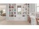 Well-organized study room featuring expansive bookshelves, a cozy desk, and natural light for a productive space at 23126 N 45Th Pl, Phoenix, AZ 85050