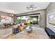 Comfortable living room with access to a covered patio, perfect for seamless indoor-outdoor living at 25326 N 19Th Dr, Phoenix, AZ 85085