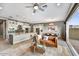 Open-concept layout with spacious kitchen and living area, seamlessly connected with modern finishes and abundant natural light at 25326 N 19Th Dr, Phoenix, AZ 85085