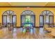 A bright and airy community center features a table and chairs for residents to enjoy at 27105 W Marco Polo Rd, Buckeye, AZ 85396