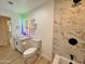 Contemporary bathroom with a vessel sink, granite countertops, and a modern shower with marble-look tile at 3021 E Shangri La Rd, Phoenix, AZ 85028