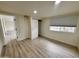 Bedroom features wood-look floors, a closet, and a window with a blind at 3021 E Shangri La Rd, Phoenix, AZ 85028