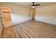 Cozy bedroom featuring sleek flooring, neutral walls and a walk in closet at 3021 E Shangri La Rd, Phoenix, AZ 85028