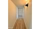 Hallway with sleek flooring, closet, and a neutral color palette at 3021 E Shangri La Rd, Phoenix, AZ 85028