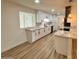 Bright kitchen featuring white cabinetry, modern countertops, and stainless steel appliances at 3021 E Shangri La Rd, Phoenix, AZ 85028