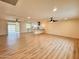 Open-concept living room flows into the kitchen, creating a spacious area with modern flooring at 3021 E Shangri La Rd, Phoenix, AZ 85028