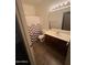 Bathroom featuring a vanity with sink, toilet, and shower with chevron curtain at 3057 E Pinto Valley Rd, San Tan Valley, AZ 85143