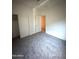Comfortable bedroom offering neutral carpet, a ceiling fan, and closet with sliding doors at 3057 E Pinto Valley Rd, San Tan Valley, AZ 85143