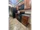 Kitchen featuring black appliances, sleek countertops, and wood cabinets at 3057 E Pinto Valley Rd, San Tan Valley, AZ 85143
