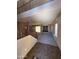 Open-concept living room with staircase, plenty of natural light, and neutral carpet at 3057 E Pinto Valley Rd, San Tan Valley, AZ 85143