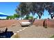 Backyard with a hammock, seating area, and decorative stone pavers at 3122 E Kristal Way, Phoenix, AZ 85050