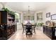 Bright breakfast nook with large windows and pool view, offers an inviting space for dining at 3644 E Del Rio St, Gilbert, AZ 85295