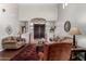 Comfortable living room with ample seating and views of the home's entryway at 3644 E Del Rio St, Gilbert, AZ 85295