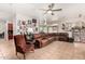 Comfortable living room with spacious seating, neutral paint, and tile flooring throughout at 3644 E Del Rio St, Gilbert, AZ 85295