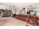 Spacious open-concept living room features neutral paint, tile floors, and ample natural light at 3644 E Del Rio St, Gilbert, AZ 85295