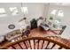 Bright living room with high ceilings, hardwood floors, spiral staircase, and lots of natural light at 3644 E Del Rio St, Gilbert, AZ 85295