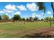 Outdoor recreation field with volleyball nets and covered picnic areas at 41413 W James Ln, Maricopa, AZ 85138