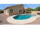 Beautiful backyard pool area with a large pool and a covered patio for outdoor entertaining at 5010 W Ivanhoe St, Chandler, AZ 85226