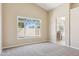 Primary bedroom with a view to the backyard pool and bathroom access at 5010 W Ivanhoe St, Chandler, AZ 85226