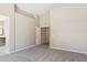 A spacious primary bedroom features high ceilings and neutral carpeting at 5010 W Ivanhoe St, Chandler, AZ 85226