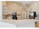 Bright kitchen features vaulted ceilings, tile floors, and modern appliances at 5010 W Ivanhoe St, Chandler, AZ 85226