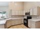 This bright eat-in kitchen features modern appliances and ample cabinet space at 5010 W Ivanhoe St, Chandler, AZ 85226