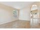 Bright living room with tile flooring, vaulted ceilings, and plenty of natural light at 5010 W Ivanhoe St, Chandler, AZ 85226